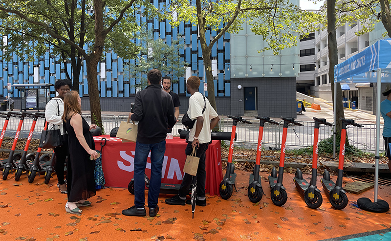 Spin e-scooters in action at the pilot launch event at Pittsburgh's Allegheny Overlook. 