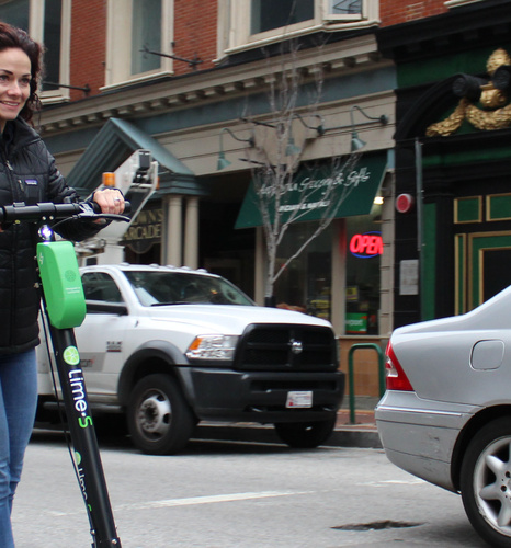 Street Design a Factor in Scooter Safety Street Design a Factor in Scooter Safety women on electric scooter in city street